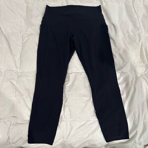 Lululemon wonder under crop pants with pockets, size 12 black
